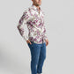 Profile angle of model showcasing the fit of Showane purple botanical shirt