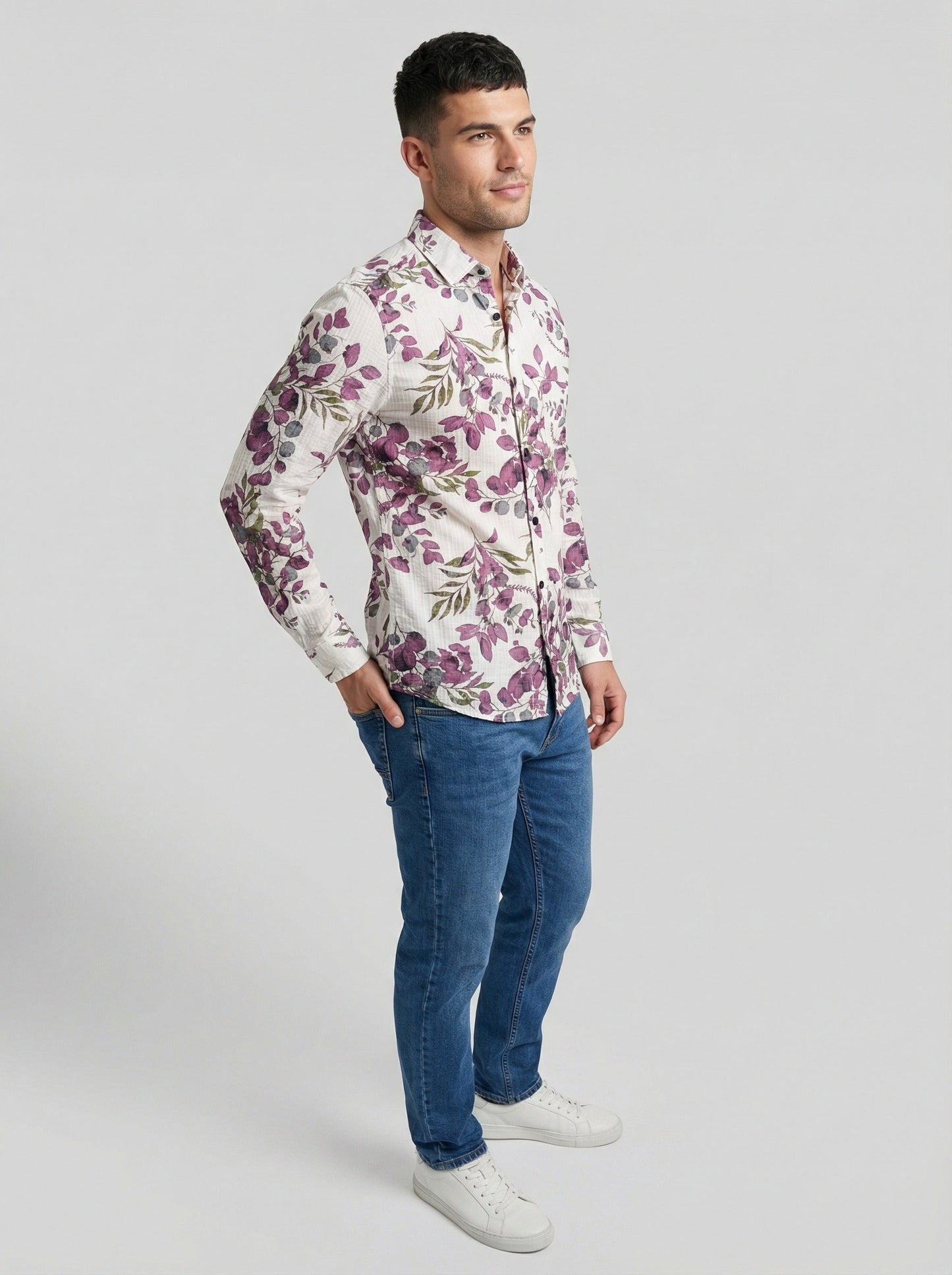 Profile angle of model showcasing the fit of Showane purple botanical shirt