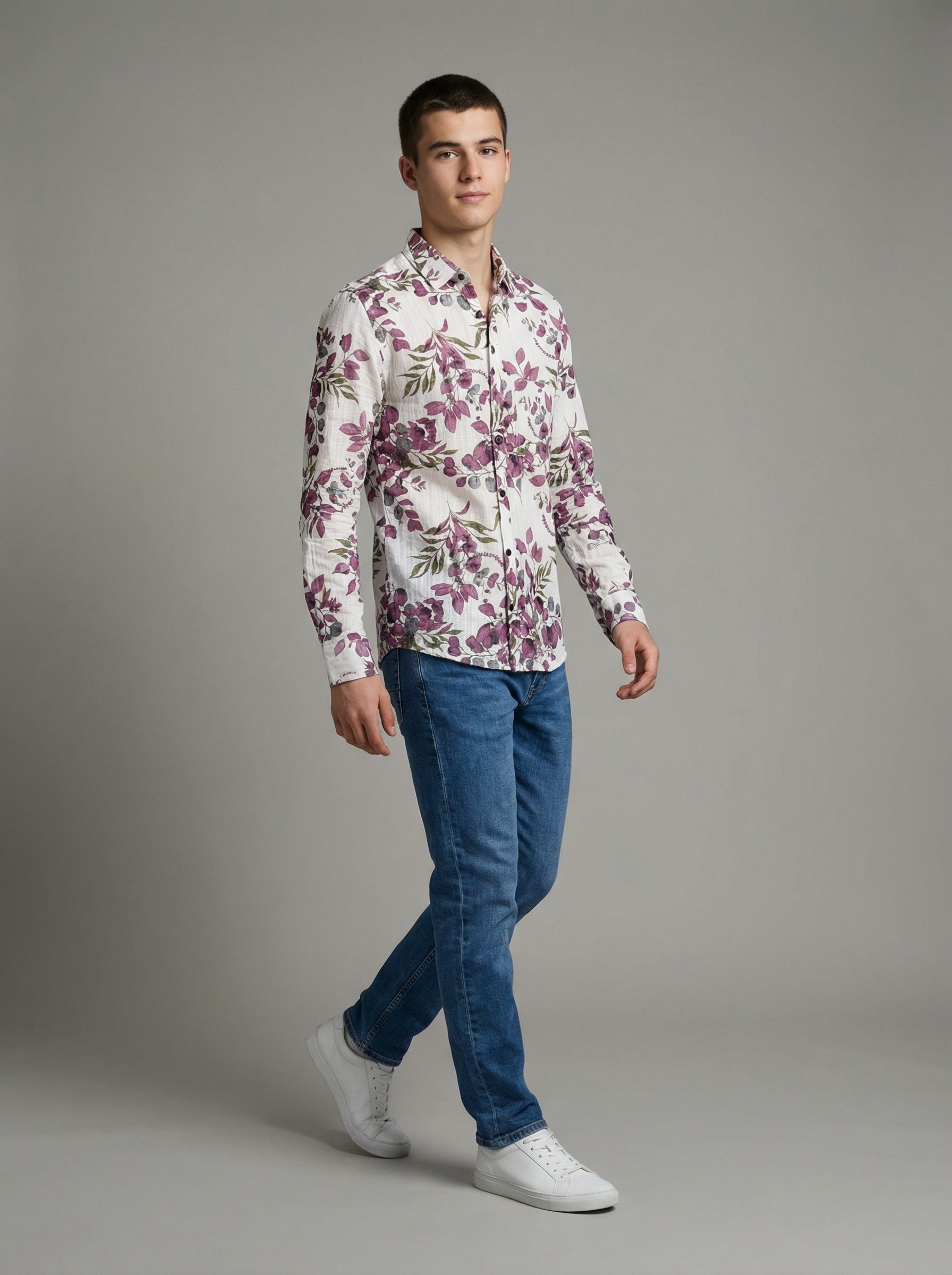 Lifestyle shot of model walking in Showane purple botanical leaf print shirt