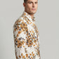 Side profile view of the floral seersucker shirt highlighting the structured collar and sleeve detail