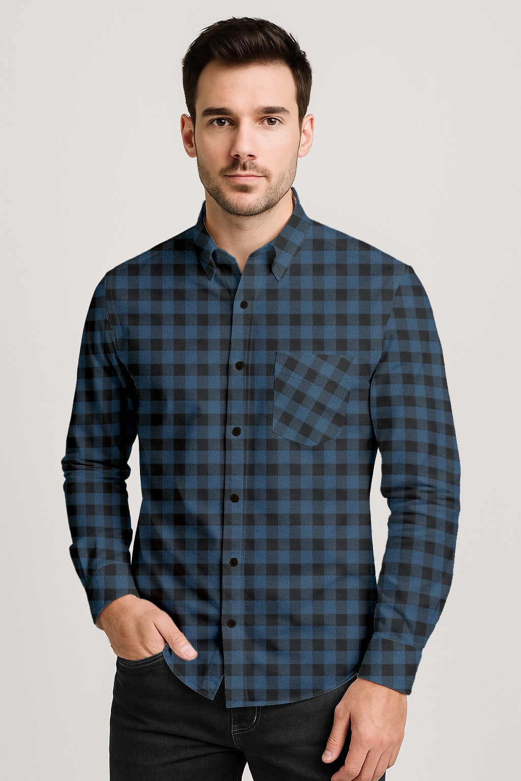 Man wearing a blue and black plaid shirt on a light gray background.
Buffalo Plaid Shirt – A Classic Button Down for Men’s Casual Style

