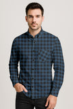 Man wearing a blue and black plaid shirt on a light gray background.
Buffalo Plaid Shirt – A Classic Button Down for Men’s Casual Style
